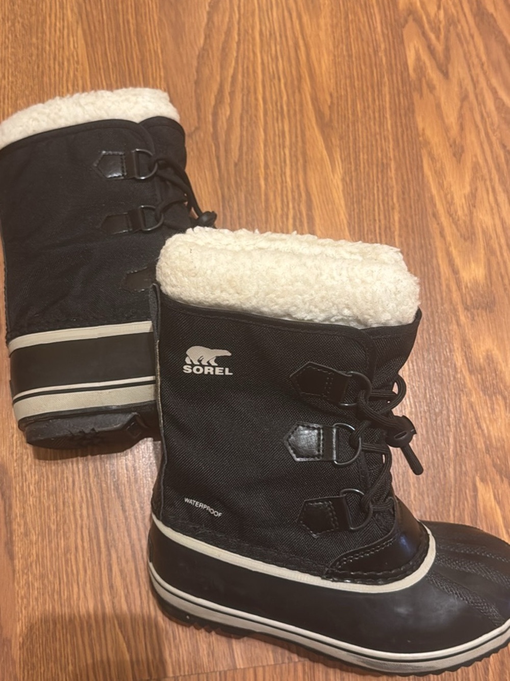 Sorel Kids Black Winter Boots with Cream Sherpa Cuff